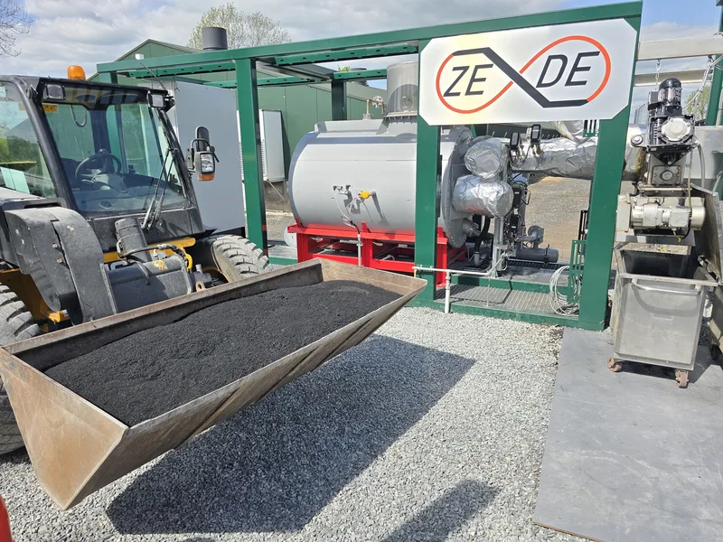 Biochar from poultry litter beside a ZEDE plant